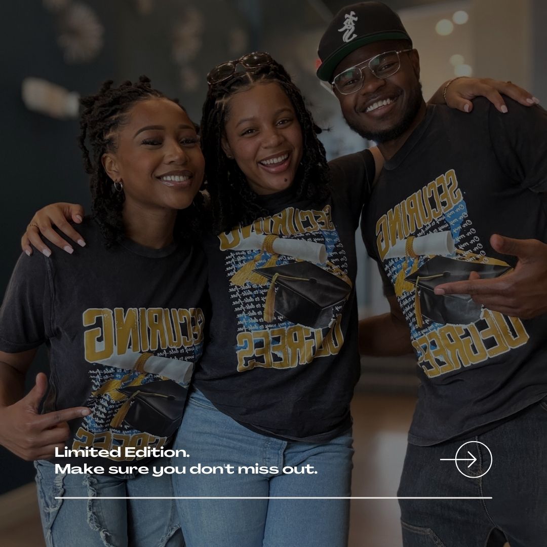 Three smiling people wearing matching “Securing Degrees” graphic t-shirts stand together with arms around each other. Text at the bottom reads, “Limited Edition. Make sure you don’t miss out.”.